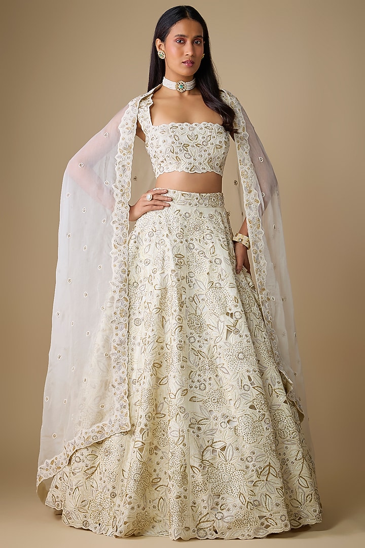 Ivory Silk Embroidered Bridal Lehenga Set by COUTURE BY NIHARIKA at Pernia's Pop Up Shop