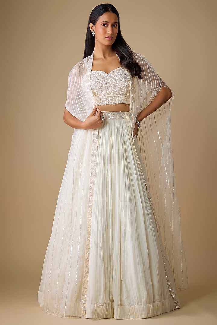 Ivory Viscose Sequins Embroidered Jacket Wedding Lehenga Set by COUTURE BY NIHARIKA at Pernia's Pop Up Shop