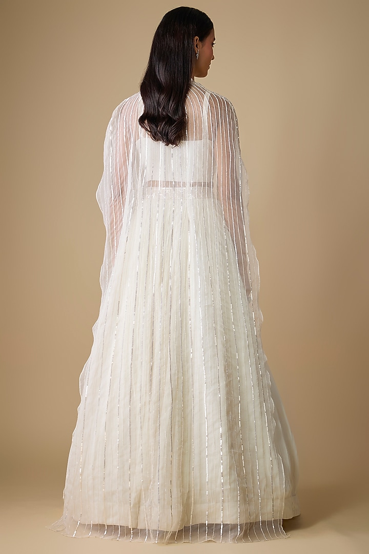 Ivory Viscose Sequins Embroidered Jacket Wedding Lehenga Set by COUTURE BY NIHARIKA at Pernia's Pop Up Shop