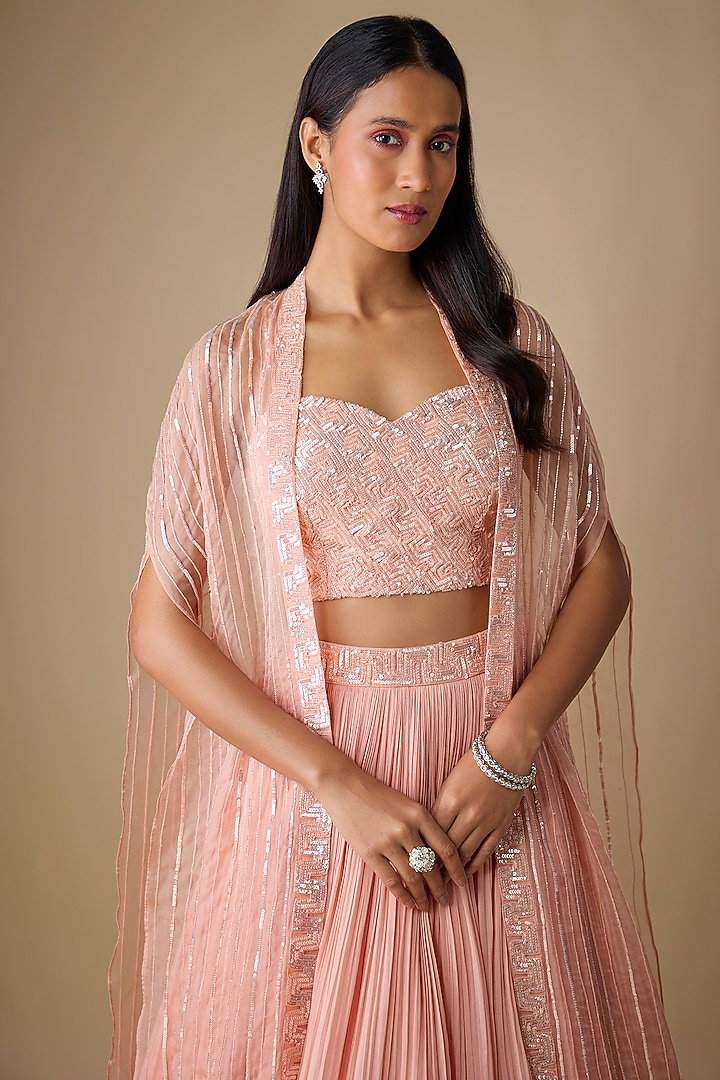 Peach Viscose Sequins Embroidered Jacket Wedding Lehenga Set by COUTURE BY NIHARIKA at Pernia's Pop Up Shop