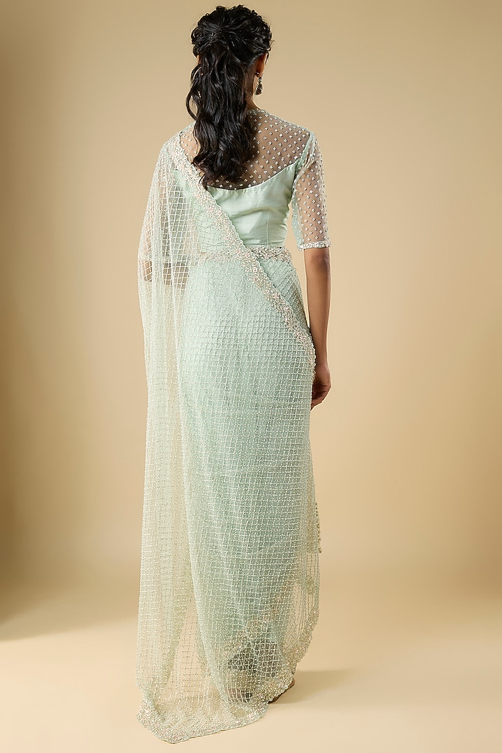 Powder Blue Net Cutdana Embroidered Reception Saree Set by COUTURE BY NIHARIKA at Pernia's Pop Up Shop