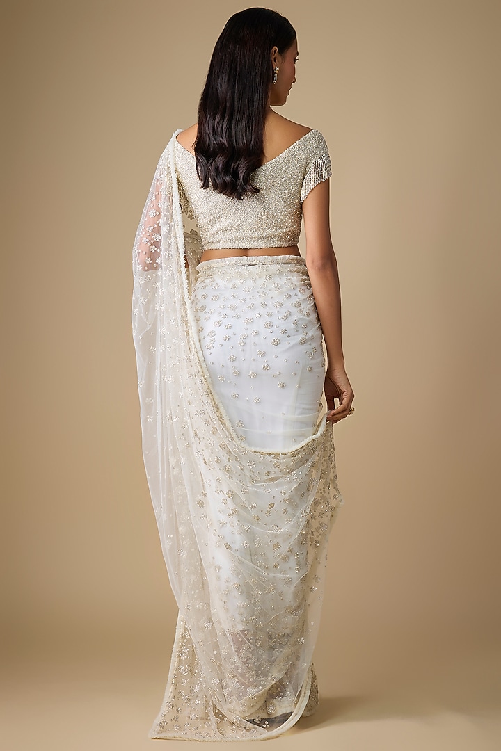 Ivory Net & Viscose Sequins Embroidered Reception Saree Set by COUTURE BY NIHARIKA at Pernia's Pop Up Shop