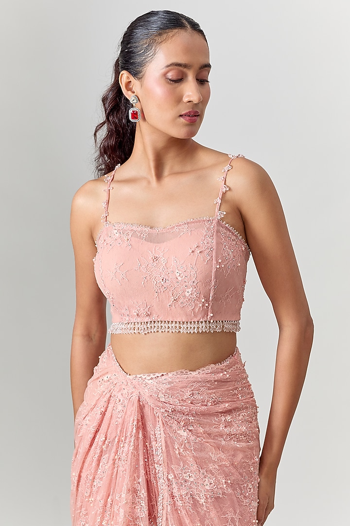 Powder Pink Net Embroidered Draped Reception Saree Set by COUTURE BY NIHARIKA at Pernia's Pop Up Shop