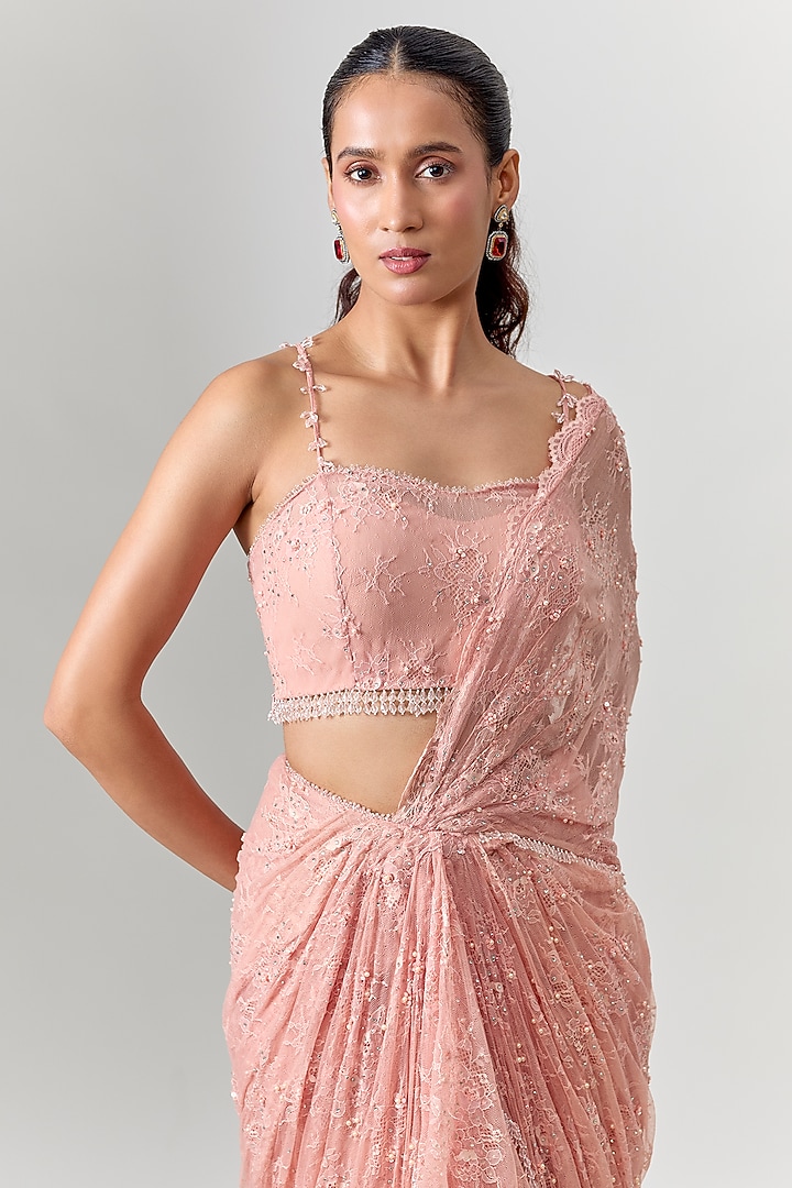 Powder Pink Net Embroidered Draped Reception Saree Set by COUTURE BY NIHARIKA at Pernia's Pop Up Shop