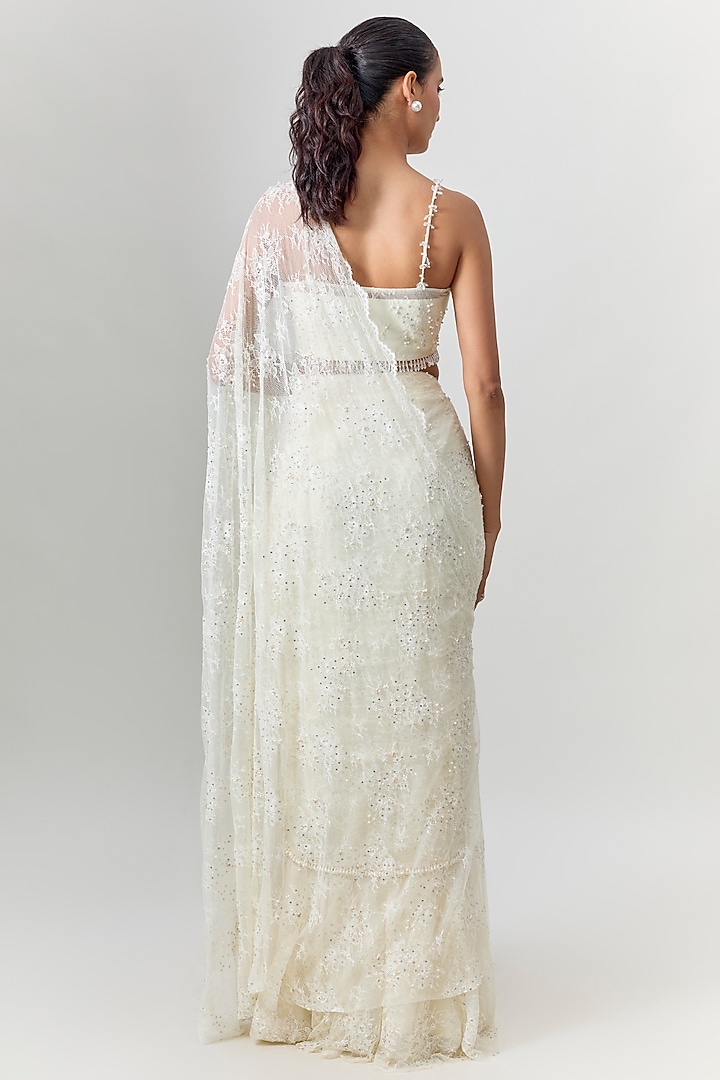 Ivory Net Embroidered Draped Reception Saree Set by COUTURE BY NIHARIKA at Pernia's Pop Up Shop