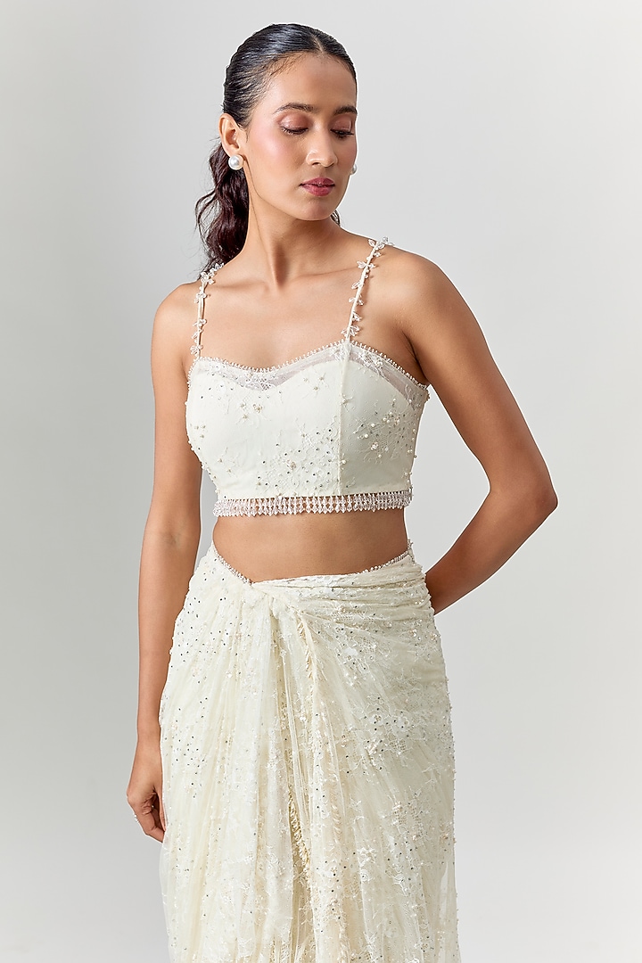 Ivory Net Embroidered Draped Reception Saree Set by COUTURE BY NIHARIKA at Pernia's Pop Up Shop