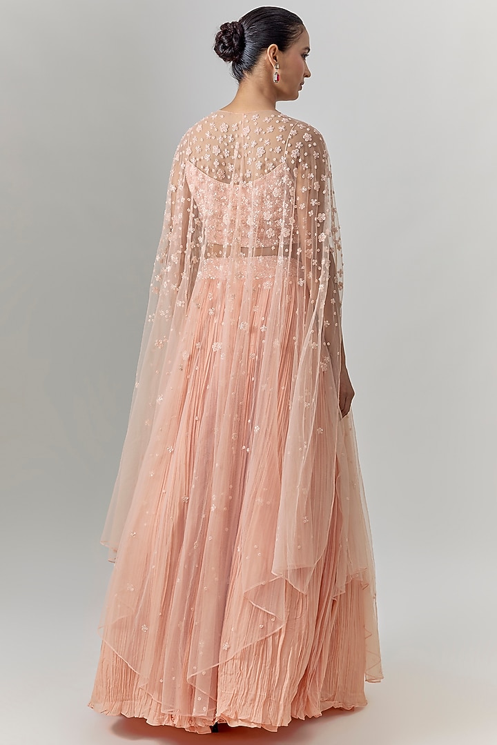 Peach Net & Viscose Motif Embroidered Wedding Lehenga Set by COUTURE BY NIHARIKA at Pernia's Pop Up Shop
