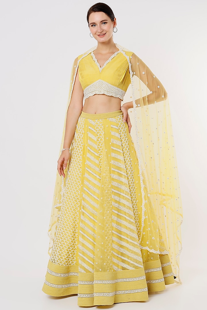 Yellow Hand Embroidered Lehenga Set by COUTURE BY NIHARIKA