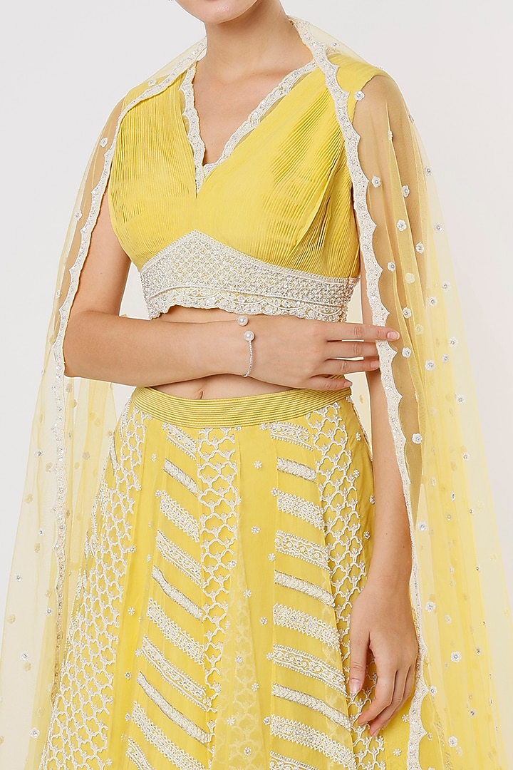 Yellow Hand Embroidered Bridal Lehenga Set by COUTURE BY NIHARIKA at Pernia's Pop Up Shop