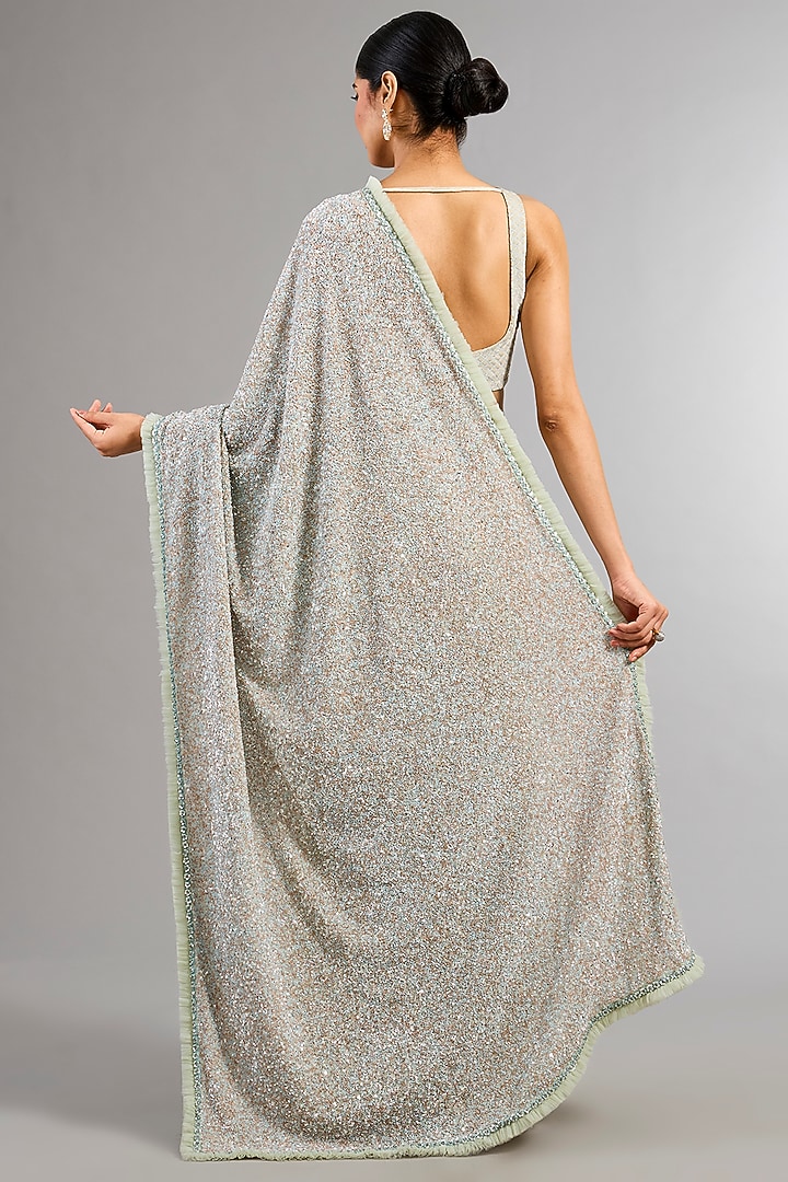 Powder Blue Georgette Sequins & Cutdana Embellished Reception Saree Set by COUTURE BY NIHARIKA at Pernia's Pop Up Shop
