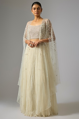 Ivory Viscose & Net Jacket Lehenga Set by COUTURE BY NIHARIKA