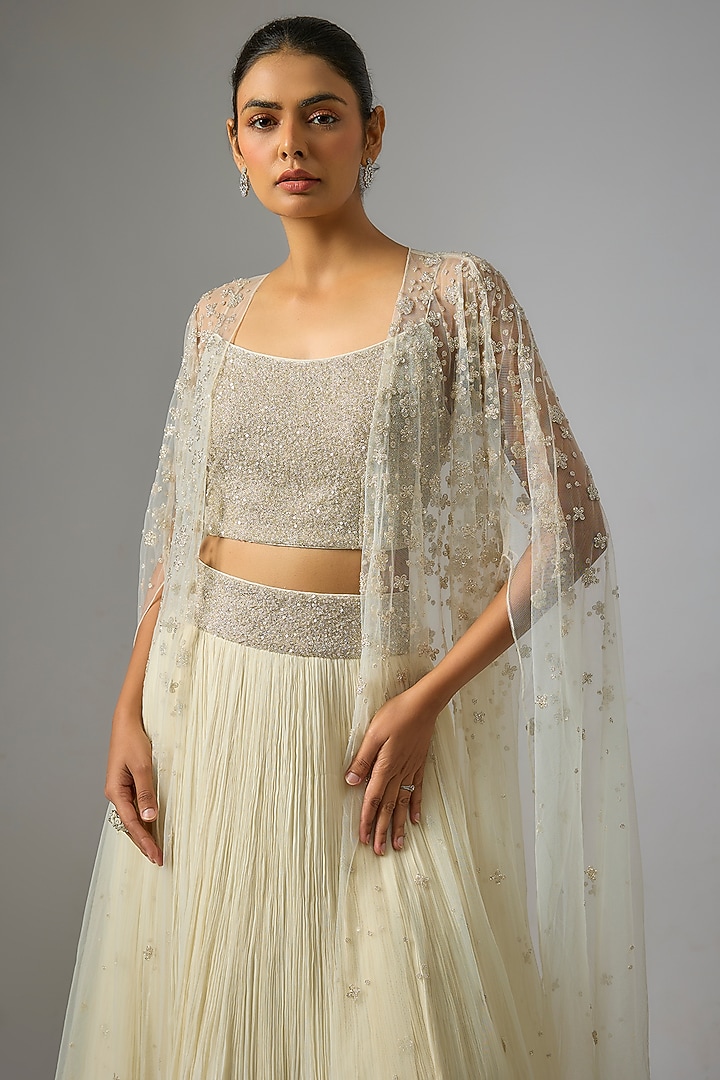 Ivory Viscose & Net Jacket Wedding Lehenga Set by COUTURE BY NIHARIKA at Pernia's Pop Up Shop