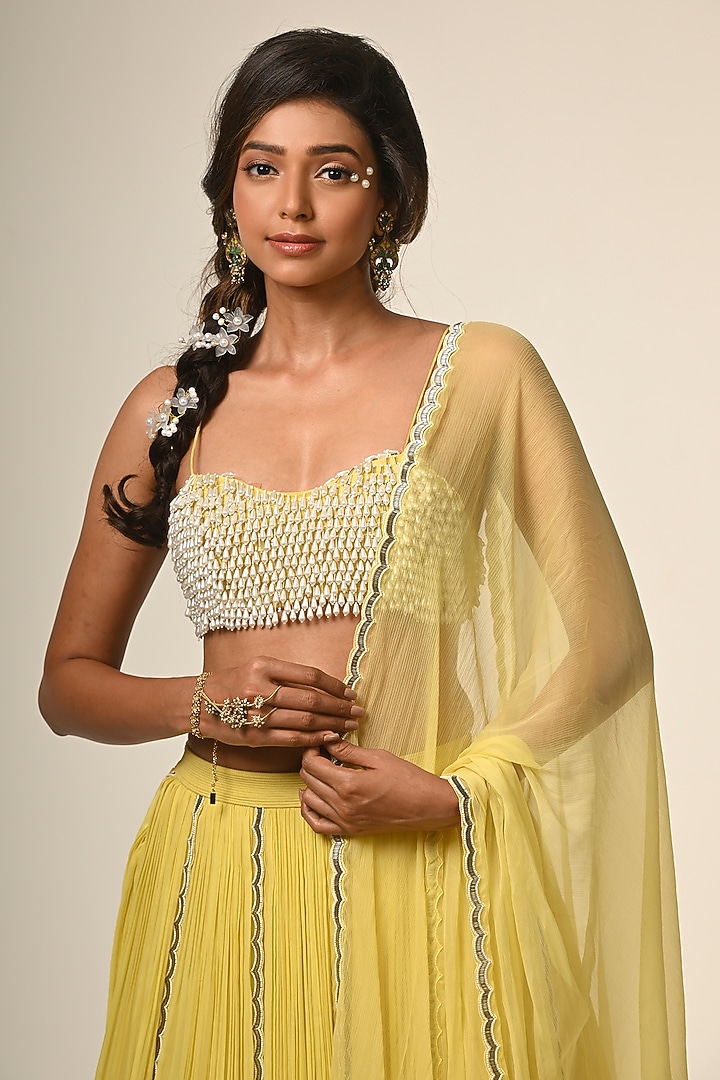 Yellow Viscose Georgette Hand Embroidered Gathered Wedding Lehenga Set by COUTURE BY NIHARIKA at Pernia's Pop Up Shop