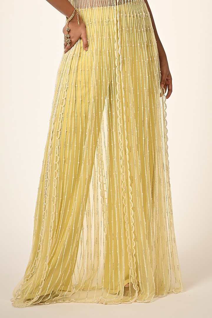 Yellow Net & Viscose Georgette Pearl Embroidered Cape Set by COUTURE BY NIHARIKA at Pernia's Pop Up Shop