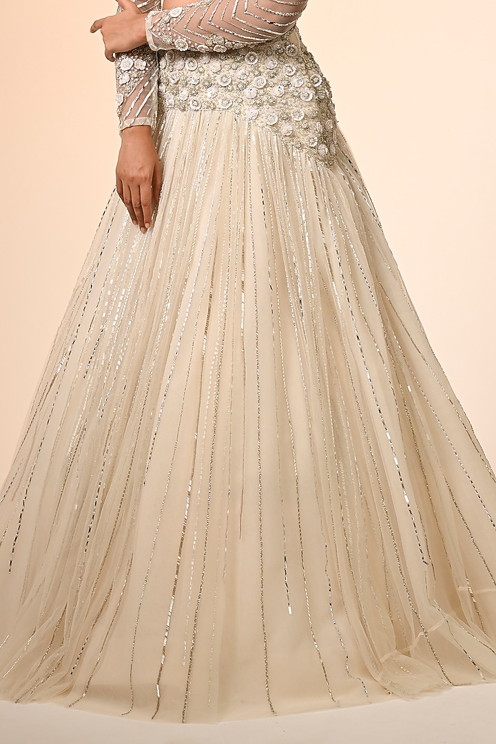 Ivory Net Floral Embroidered Wedding Lehenga Set by COUTURE BY NIHARIKA at Pernia's Pop Up Shop
