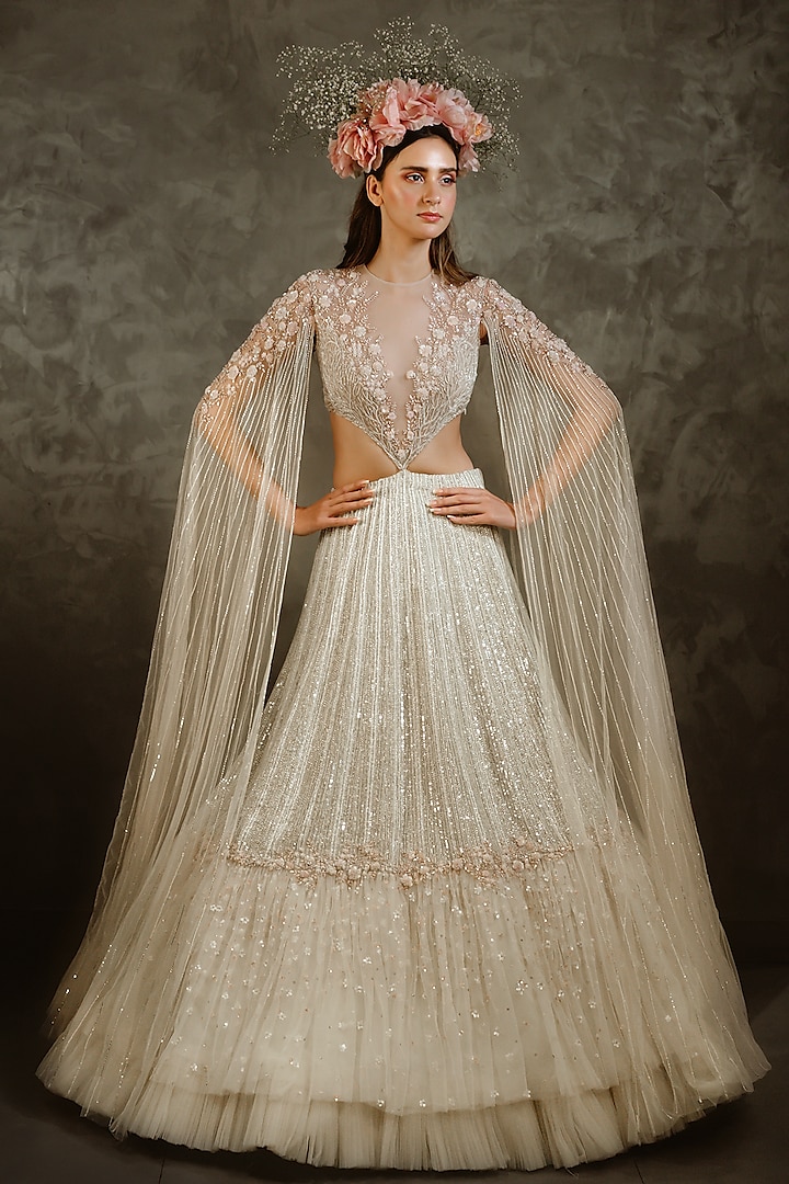 Off White Embellished Frilled Lehenga Set by COUTURE BY NIHARIKA