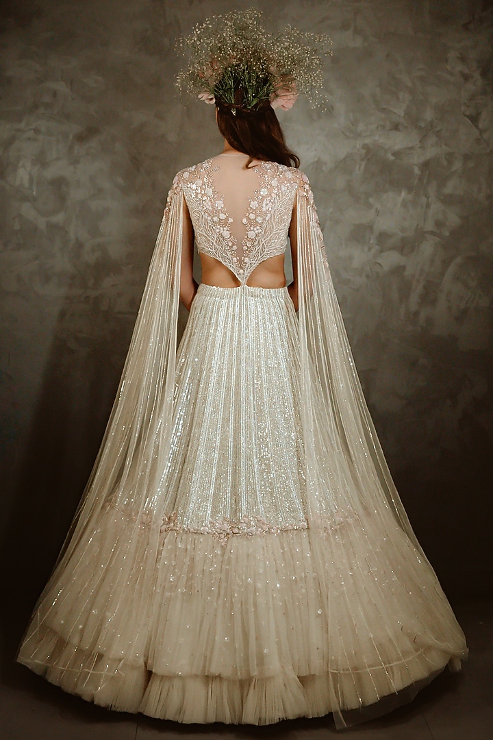 Off White Embellished Frilled Bridal Lehenga Set by COUTURE BY NIHARIKA at Pernia's Pop Up Shop