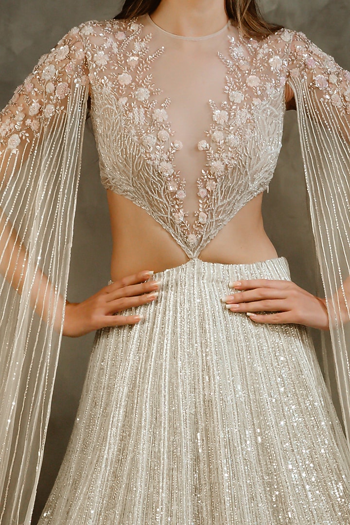 Off White Embellished Frilled Bridal Lehenga Set by COUTURE BY NIHARIKA at Pernia's Pop Up Shop