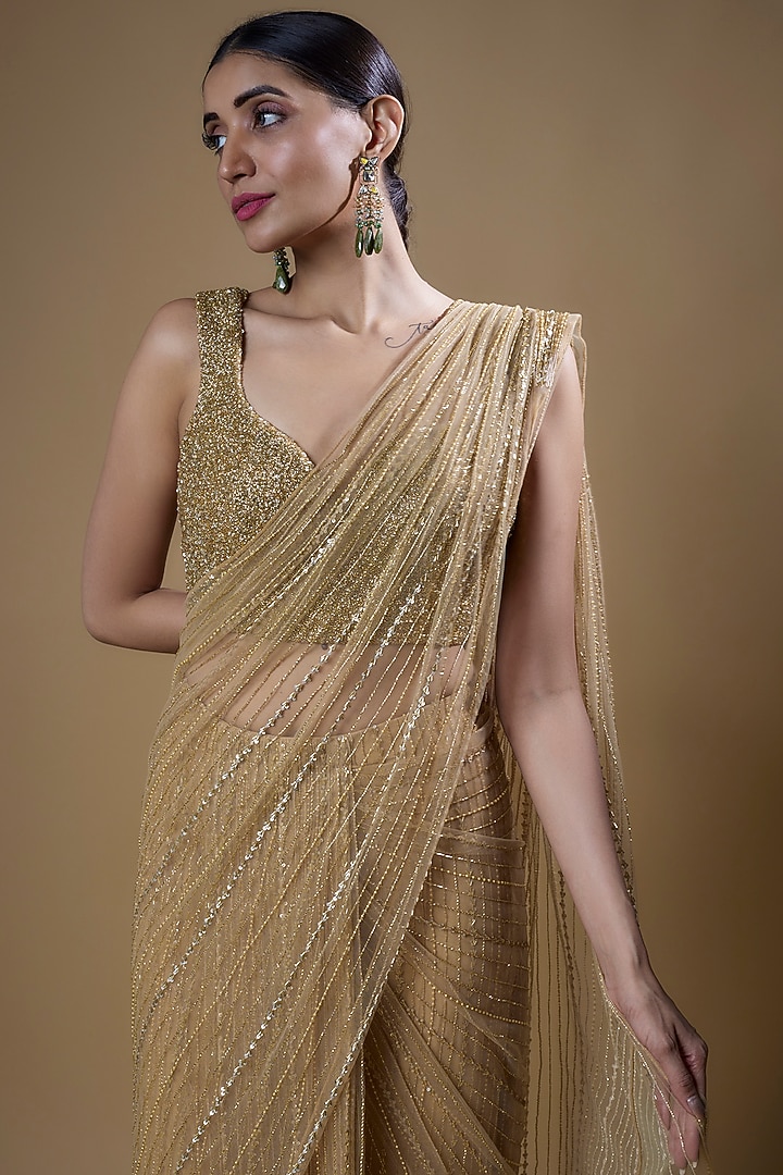 Gold Organza Cutdana Embroidered Reception Saree Set by COUTURE BY NIHARIKA at Pernia's Pop Up Shop