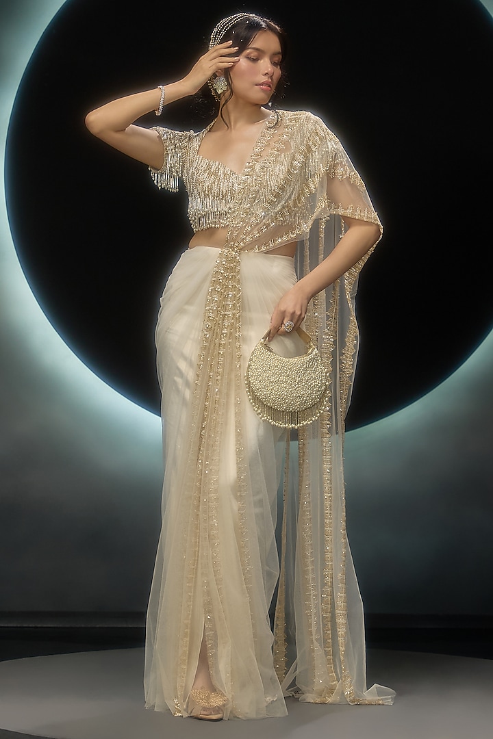 Golden Net Hand Embroidered Draped Reception Saree Set by COUTURE BY NIHARIKA at Pernia's Pop Up Shop