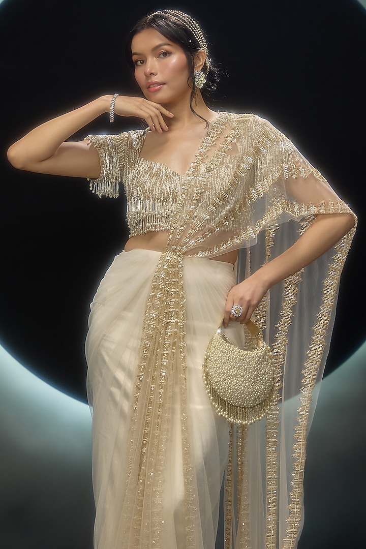 Golden Net Hand Embroidered Draped Reception Saree Set by COUTURE BY NIHARIKA at Pernia's Pop Up Shop