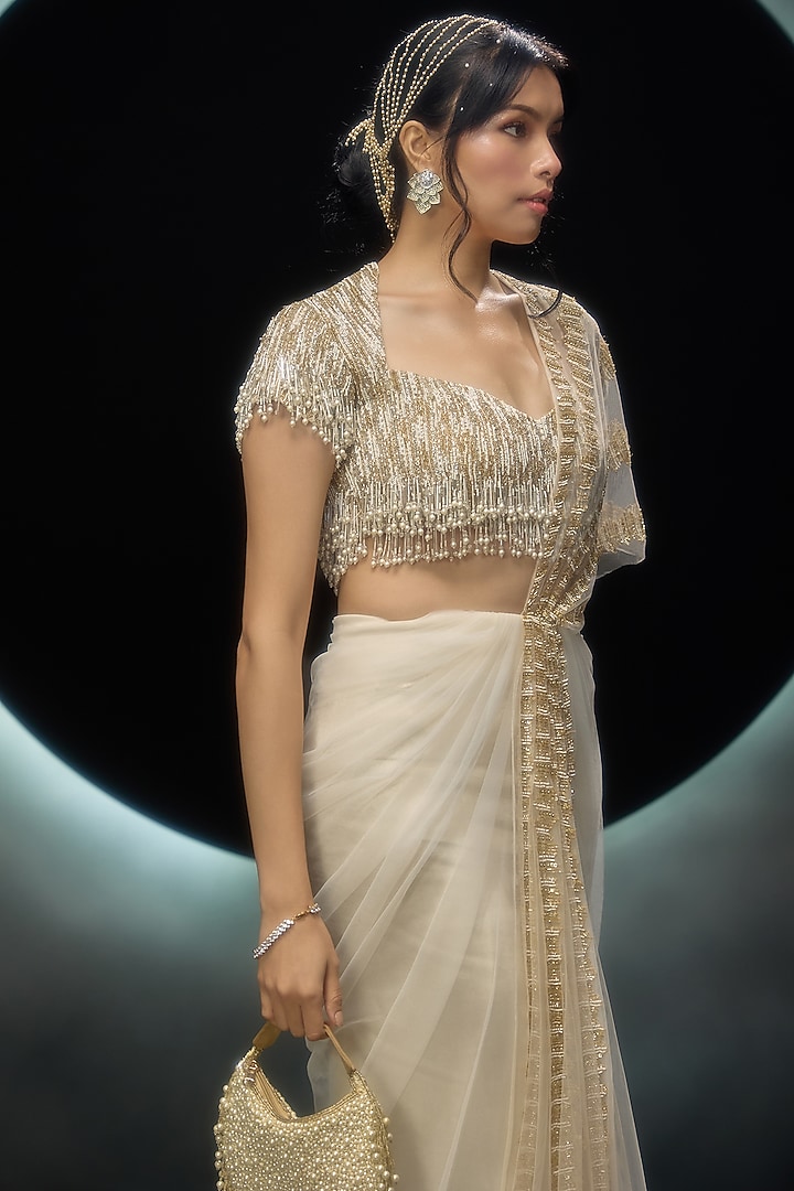 Golden Net Hand Embroidered Draped Reception Saree Set by COUTURE BY NIHARIKA at Pernia's Pop Up Shop