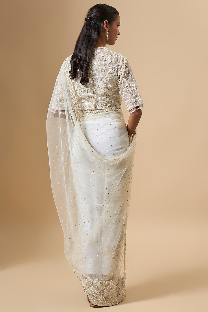 Ivory Net & Organza Floral Embroidered Reception Saree Set by COUTURE BY NIHARIKA at Pernia's Pop Up Shop