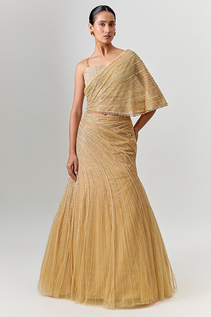 Gold Net & Viscose Sequin Embroidered Wedding Lehenga Set by COUTURE BY NIHARIKA at Pernia's Pop Up Shop