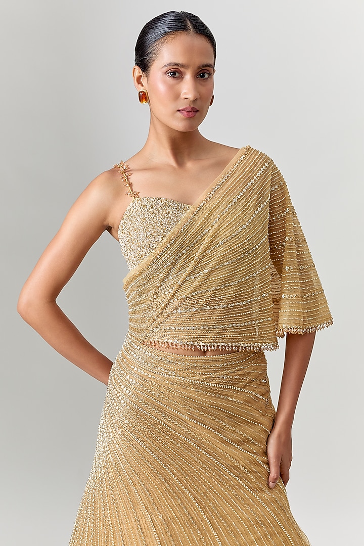 Gold Net & Viscose Sequin Embroidered Wedding Lehenga Set by COUTURE BY NIHARIKA at Pernia's Pop Up Shop