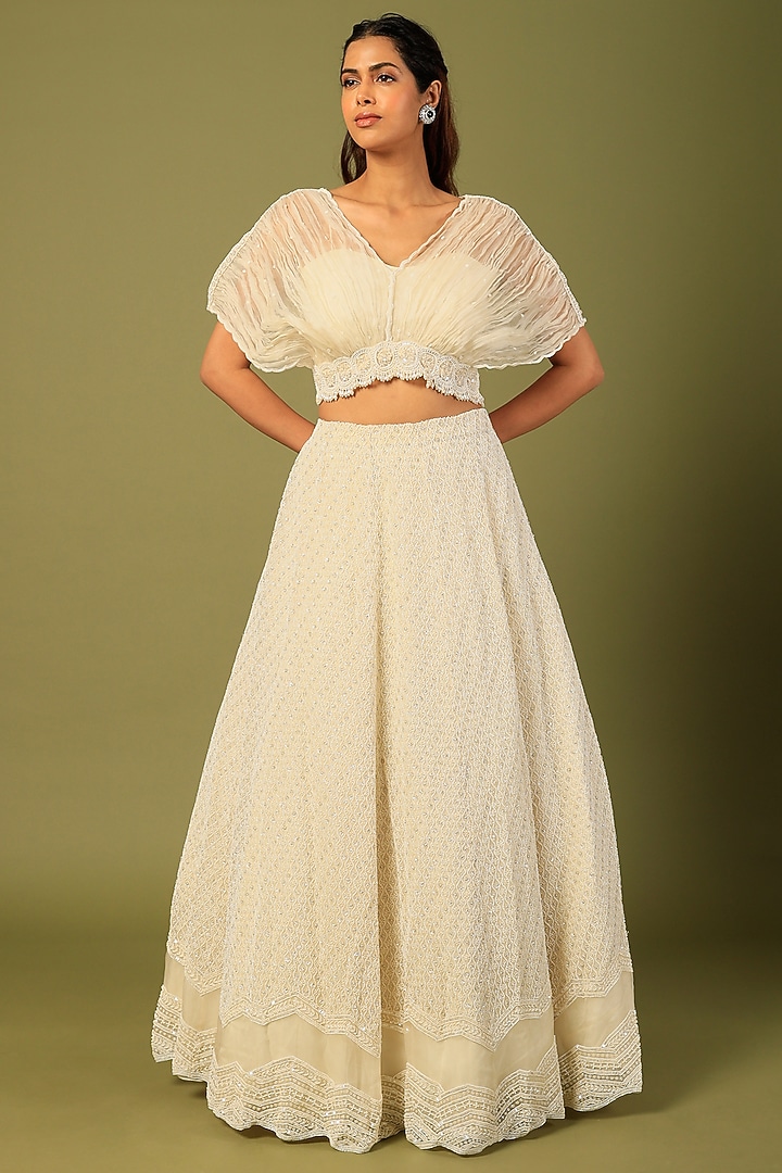 White Embroidered Bridal Lehenga Set by COUTURE BY NIHARIKA at Pernia's Pop Up Shop