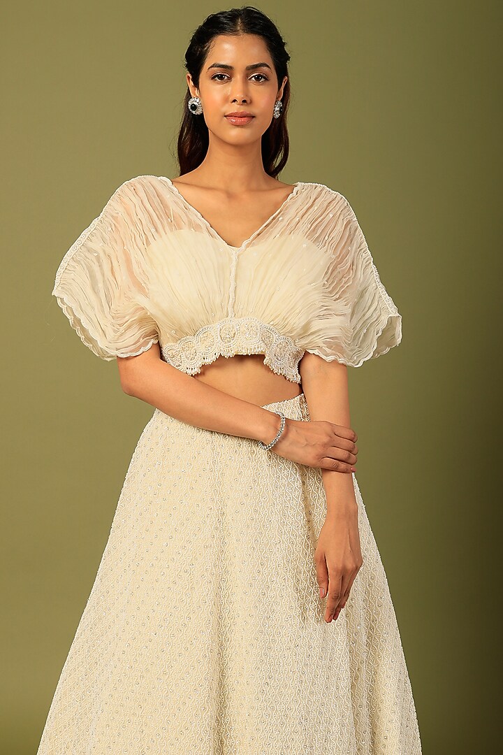 White Embroidered Bridal Lehenga Set by COUTURE BY NIHARIKA at Pernia's Pop Up Shop