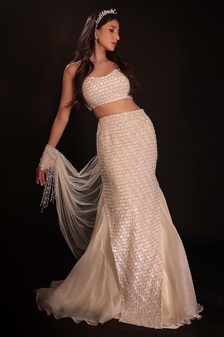 Ivory Net Sequin Embroidered Draped Skirt Set by COUTURE BY NIHARIKA at Pernia's Pop Up Shop