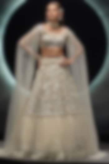 Ivory Taiban Net Hand Embroidered Bridal Lehenga Set by COUTURE BY NIHARIKA at Pernia's Pop Up Shop