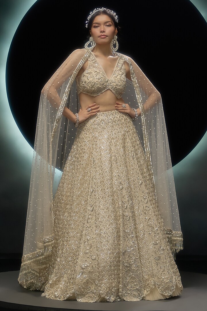 Ivory Net Hand & Machine Embroidered Bridal Lehenga Set by COUTURE BY NIHARIKA at Pernia's Pop Up Shop
