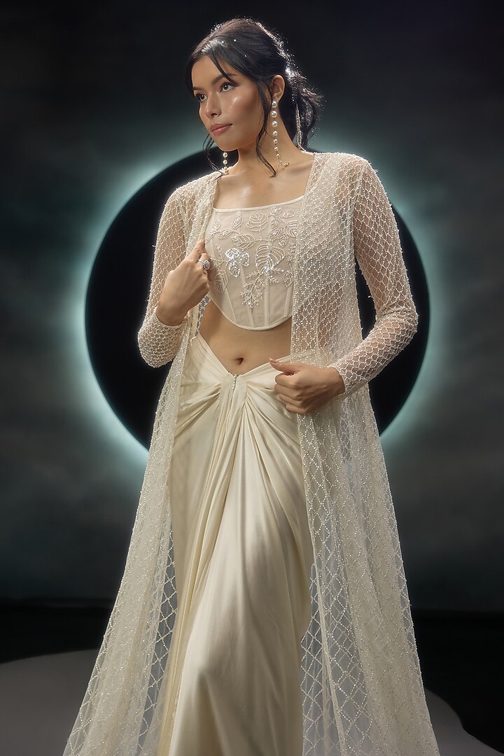 Ivory Net Embroidered Jacket Set by COUTURE BY NIHARIKA at Pernia's Pop Up Shop