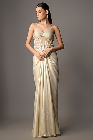 Gold Net & Shimmer Georgette Hand Embroidered Draped Gown by COUTURE BY NIHARIKA
