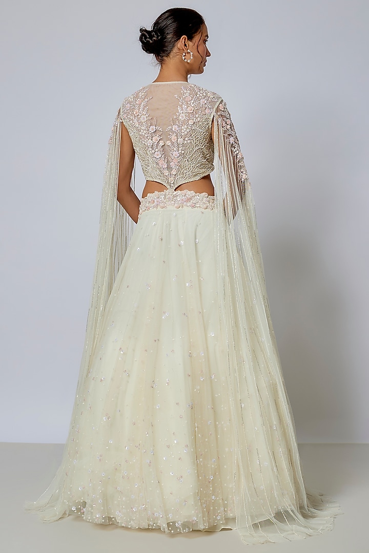 Ivory Net Cutdana Embroidered Wedding Lehenga Set by COUTURE BY NIHARIKA at Pernia's Pop Up Shop