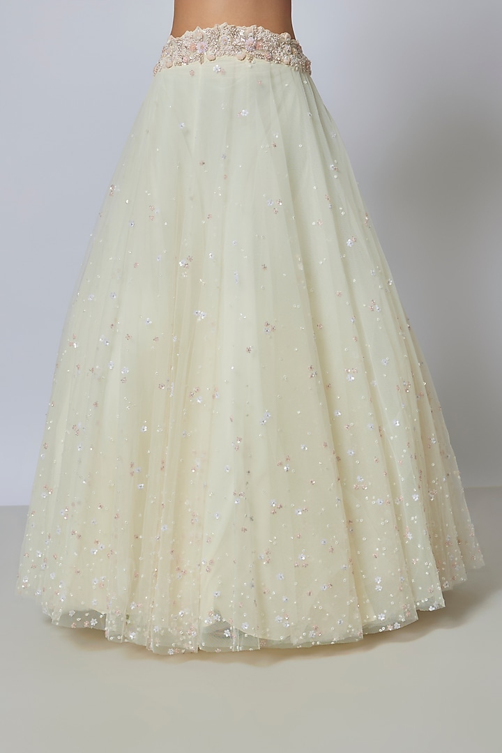 Ivory Net Cutdana Embroidered Wedding Lehenga Set by COUTURE BY NIHARIKA at Pernia's Pop Up Shop