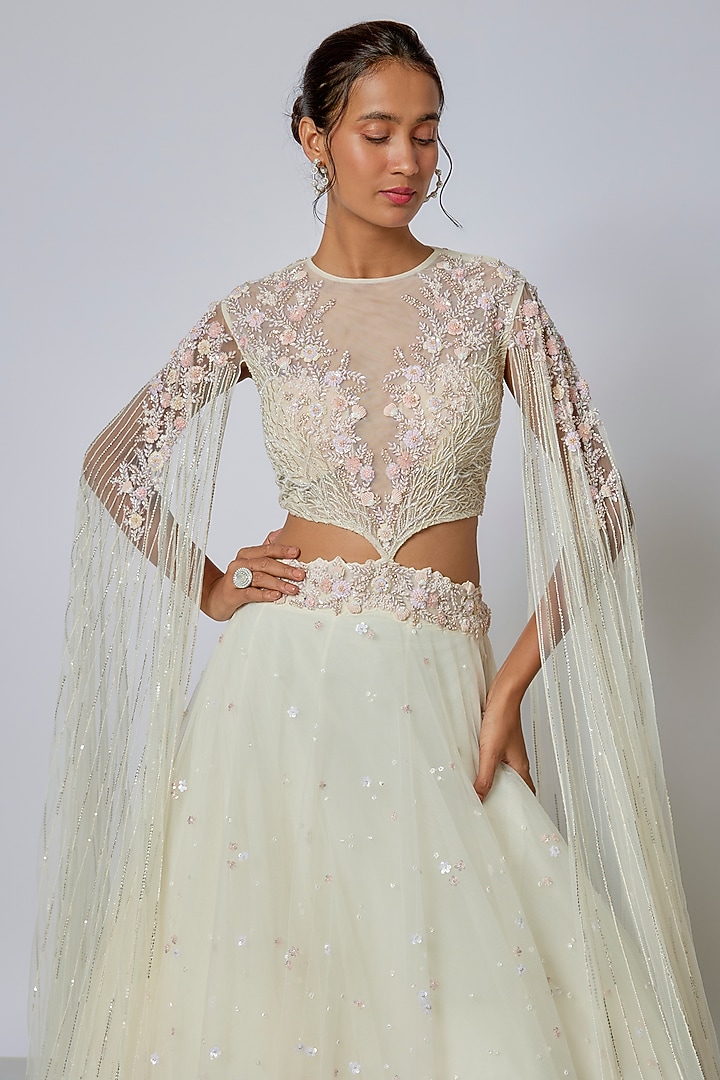 Ivory Net Cutdana Embroidered Wedding Lehenga Set by COUTURE BY NIHARIKA at Pernia's Pop Up Shop
