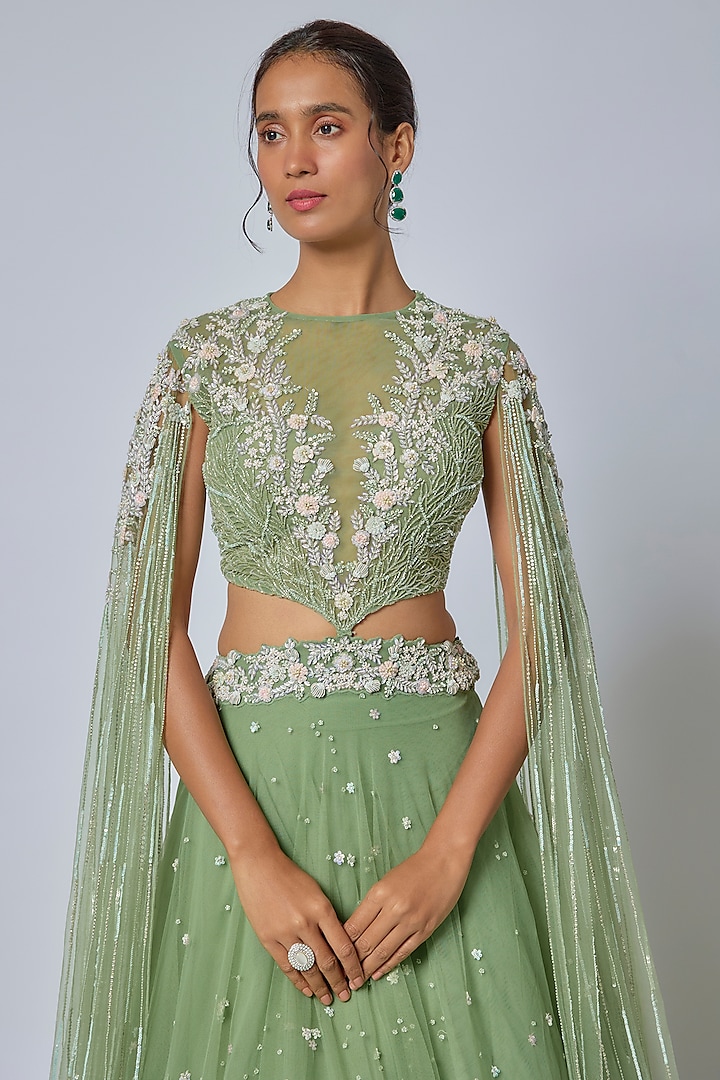 Green Net Cutdana Embroidered Wedding Lehenga Set by COUTURE BY NIHARIKA at Pernia's Pop Up Shop