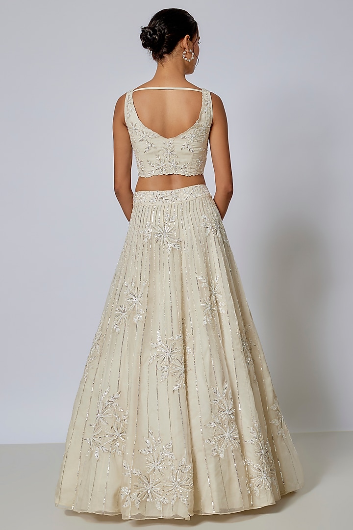 Ivory Organza Cutdana Floral Embroidered Wedding Lehenga Set by COUTURE BY NIHARIKA at Pernia's Pop Up Shop