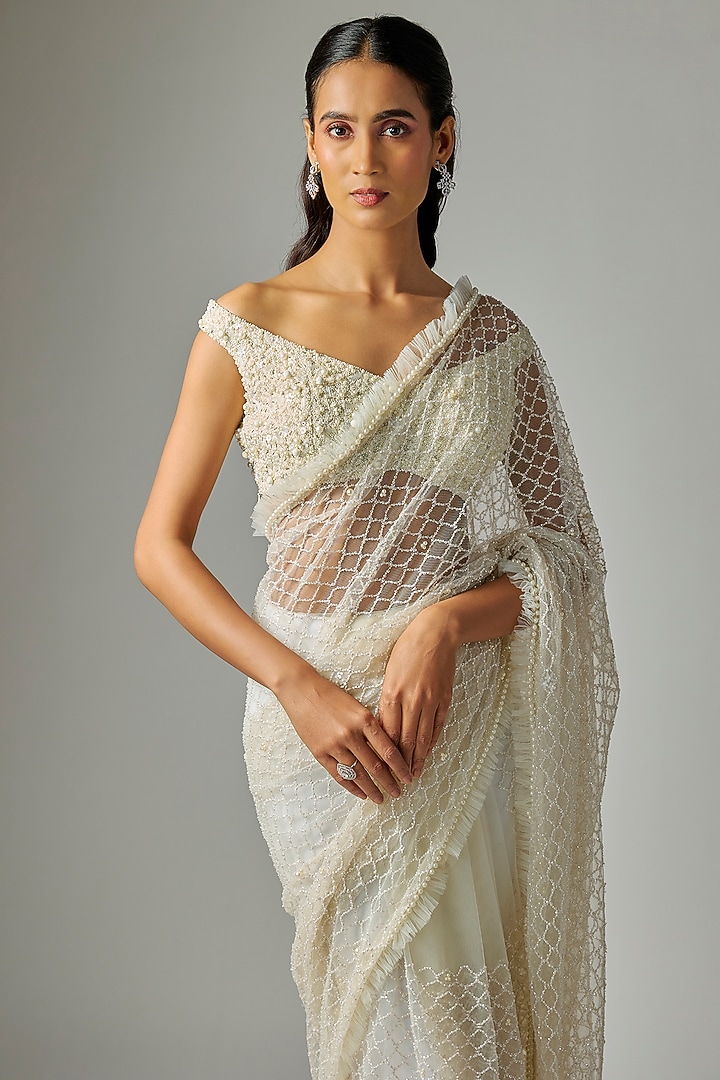 Ivory Net Hand Embroidered Reception Saree Set by COUTURE BY NIHARIKA at Pernia's Pop Up Shop