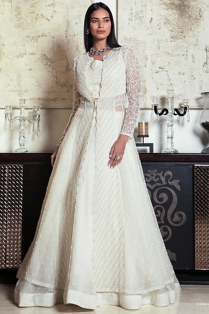 Ivory Organza Pearl Embroidered Jacket Wedding Lehenga Set by COUTURE BY NIHARIKA at Pernia's Pop Up Shop