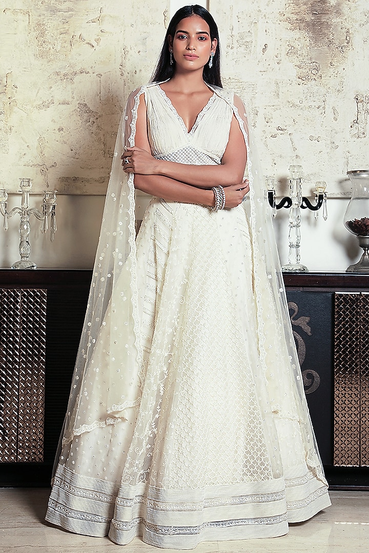 Ivory Embroidered Lehenga Set by COUTURE BY NIHARIKA