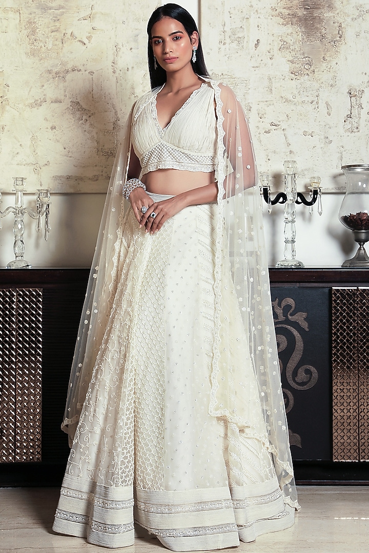 Ivory Embroidered Bridal Lehenga Set by COUTURE BY NIHARIKA at Pernia's Pop Up Shop