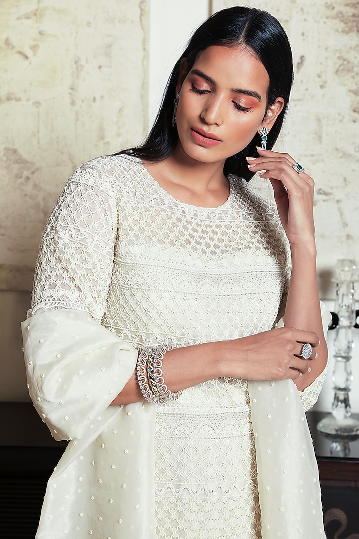 Ivory Embroidered Kurta Set by COUTURE BY NIHARIKA at Pernia's Pop Up Shop