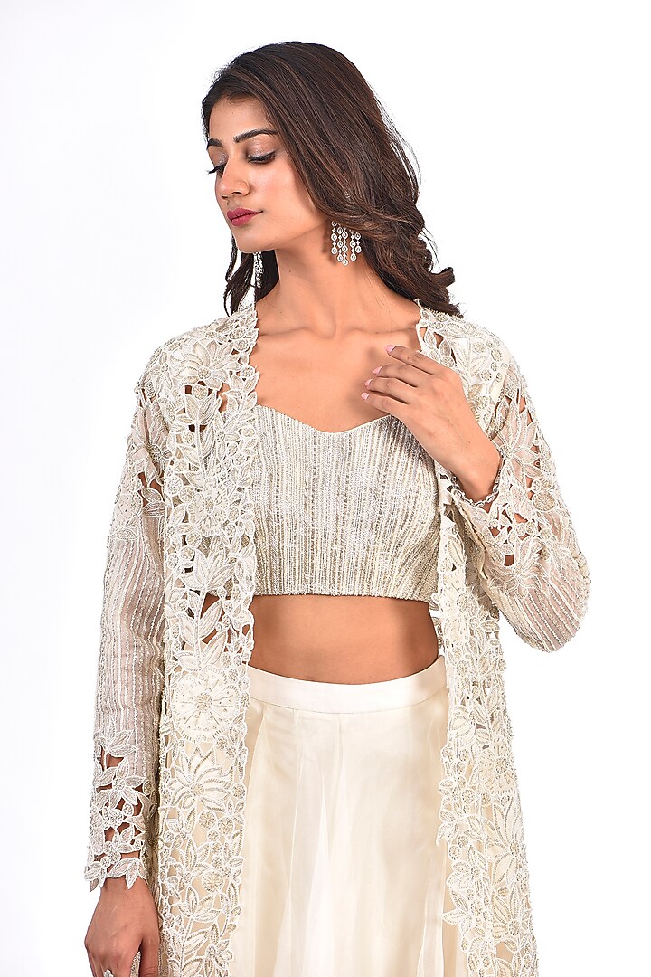 Ivory Net Cutwork Embroidered Jacket Set by COUTURE BY NIHARIKA at Pernia's Pop Up Shop