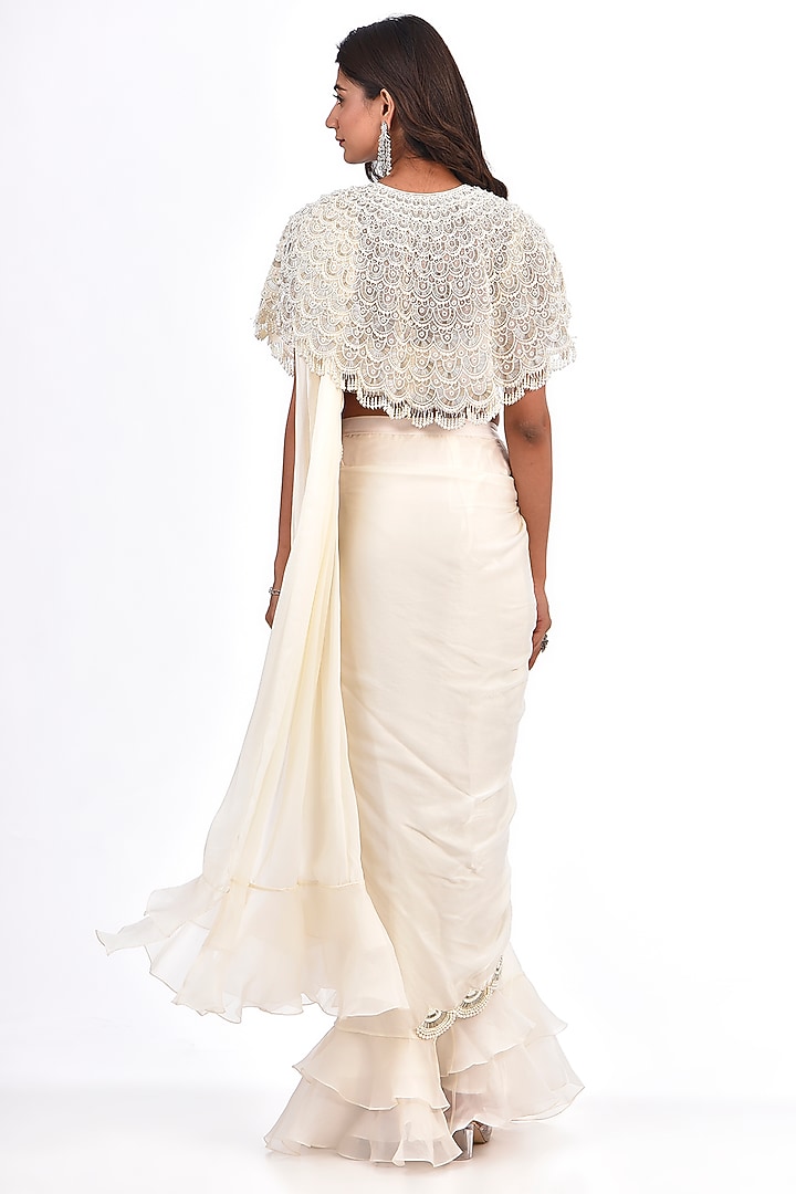Ivory Satin Georgette Pearl Work Reception Saree Set by COUTURE BY NIHARIKA at Pernia's Pop Up Shop