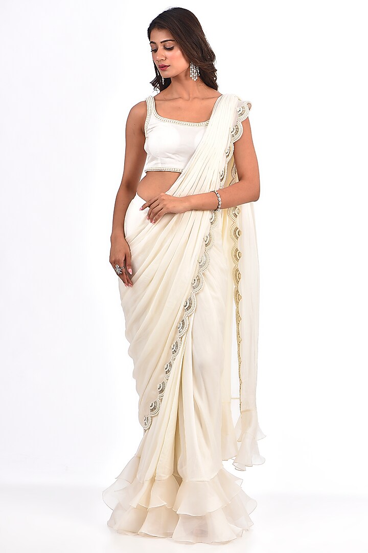 Ivory Satin Georgette Pearl Work Reception Saree Set by COUTURE BY NIHARIKA at Pernia's Pop Up Shop