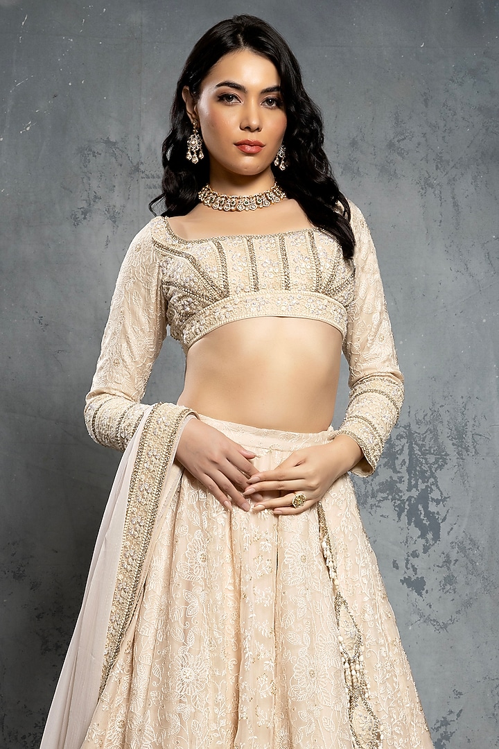 Ecru Beige Tulle Tropical Motif Embellished Bridal Lehenga Set by Neeta Lulla at Pernia's Pop Up Shop